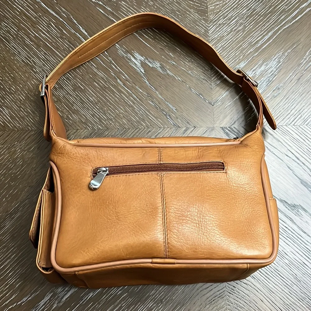 Cabela’s Columbia’s leather natural tan small bag